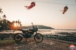 Goan beachside sunset with Royal Enfield Himalayan in foreground